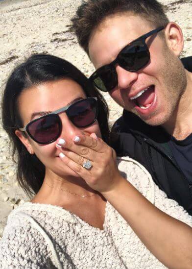 Lea Michele flaunting her ring after getting proposed by Zandy Reich.
